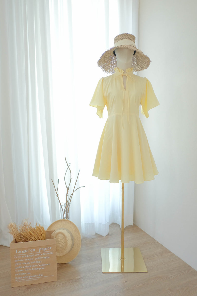 Elodie Vintage pastel pale yellow short summer dress